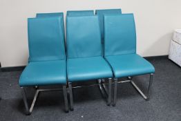 A set of six contemporary turquoise leather dining chairs on metal legs