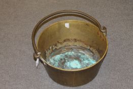 A heavy brass jam pan