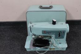 A 20th century Singer electric sewing machine