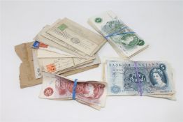 A collection of out of circulation British banknotes, comprising seventy-four £1 notes,