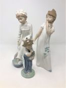 A Nao china figure : Young girl in nightdress washing her feet, height 28 cm,