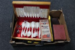 A box of carved serving tray, back pack, canteen of cutlery,