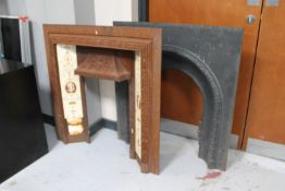 Two cast iron fire inserts