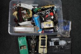 A plastic crate containing play-worn die-cast vehicles, racing cars etc .
