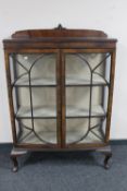 An Edwardian double door display cabinet