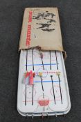 A boxed vintage table top Puck Master ice hockey game