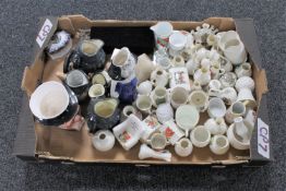 A box of crested china, character jugs,