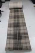 A tartan patterned hall runner
