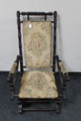 An antique mahogany American style rocking chair