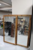 Two pine framed overmantel mirrors
