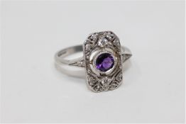 A 9ct gold amethyst and diamond ring