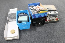 A cased Eumig projector, boxed Rollei slide projector,