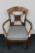 An antique mahogany armchair