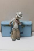 A Lladro china figure : Cowboy, height 27 cm.
