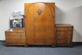 A three piece oak Art Deco bedroom suite