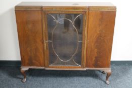 An early 20th century mahogany break-front bookcase