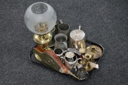 A tray of brass oil lamp with shade, brass embossed bellows, plated wares, pewter tankards,