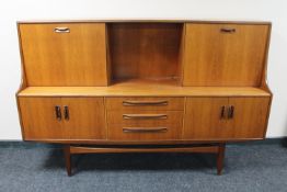 A mid 20th century teak G-Plan sideboard