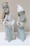 Two Lladro figures of a boy with crown and girl carrying a hen