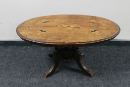 A Victorian inlaid mahogany pedestal occasional table