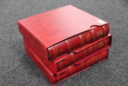 Three leather Documenta Vaticana folders in slip covers