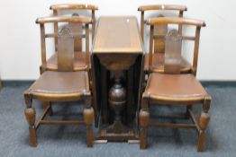 A 1930's oak dining room suite