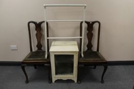 A pair of dining chairs,