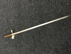 A mid twentieth century ceremonial sword with etched blade depicting scenes of London