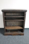 A set of antique carved oak open bookshelves