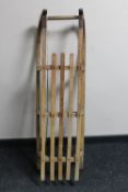 A vintage 20th century wooden sledge