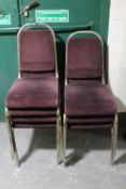 A set of seven metal framed stacking pub chairs