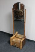 An Art Deco walnut framed cheval mirror,