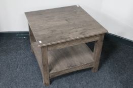 A contemporary two tier lamp table