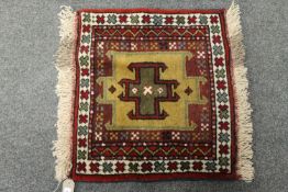 A Caucasian prayer rug,