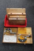 A basket of six cased micro metre calipers
