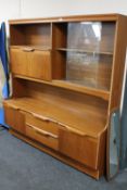 A late 20th century teak wall unit