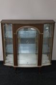 A mid 20th century melamine display cabinet