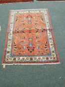 An Eastern carpet on salmon ground,