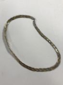 A three tone flat linked necklace, the bale stamped 925, 13.5g.