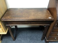A Victorian mahogany turnover top tea table
