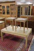 A contemporary oak rectangular coffee table together with pair of carved oak dining chairs