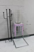 A contemporary glass topped lamp table on metal base together with a painted side table and glass