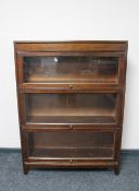 A three piece mahogany sectional bookcase