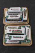 Two trays containing fifteen boxed Atlas Eddie Stobart vehicles