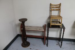 A bamboo child's chair, plant stand,