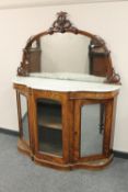 A Victorian walnut marble topped mirror backed chiffonier,