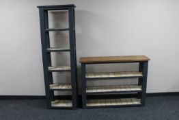 Two sets of reclaimed pine open bookshelves