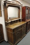 An Edwardian oak mirror backed sideboard,