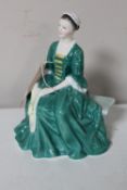 A Royal Doulton figure,