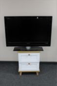 A Philips 37 inch LCD TV (no lead or remote) and a bedside stand